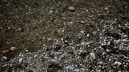 Texture of wet stone in evening contrasting light. Photo of the Moraca River, Montenegro. High quality photo. High quality photo