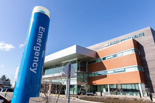 Beaverton, Oregon, USA - March 7, 2024 - Kaiser Permanente hospital health insurance provider logo emblem sign close-up