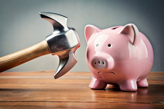 Hammer About To Smash Piggy Bank - Financial Crisis Concept