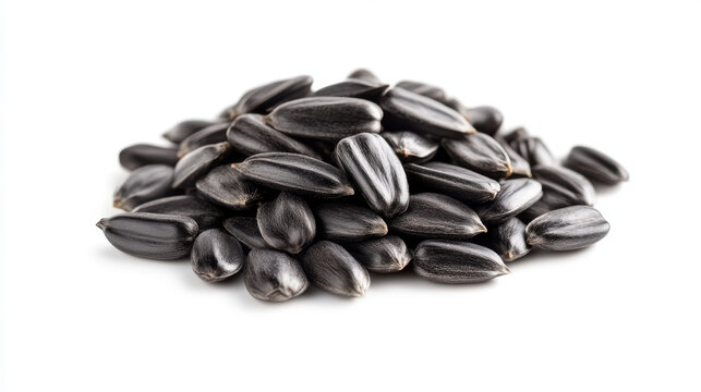A close-up view of delicious sunflower black seeds, isolated on a clean white background, showcasing their rich texture and glossy finish