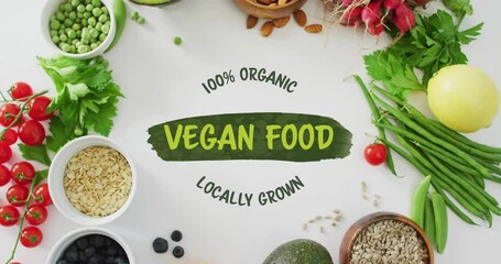 100 percent Organic Vegan Food Locally Grown text animation over fresh vegetables and grains