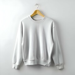 Blank white sweatshirt hanging on a wooden hanger. perfect for showcasing your design or logo.