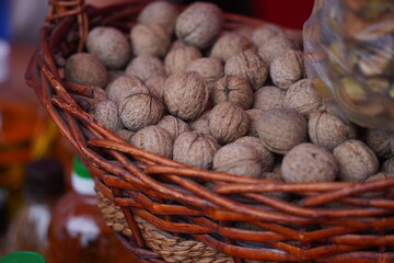 The nuts are laid out in a wicker basket.