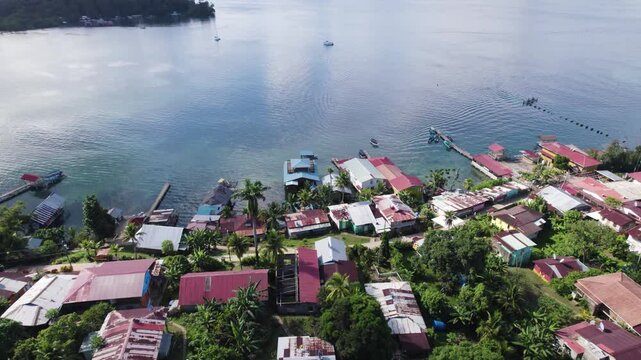 Bastimentos island in bocas del toro, panama, with lush greenery and coastal homes, aerial view