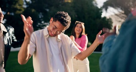 Dance, party and man with friends in crowd for celebration, concert and energy in nature. Summer holiday, community and music with people dancing in audience for gen z, social event or vacation - Powered by Adobe
