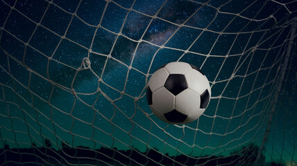 Naklejka premium Soccer ball hitting the net at night under a starry sky, symbolizing goal achievement and triumph in sports.