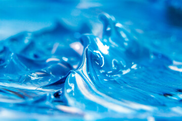 Blue background with oil paint. Abstract acrylic paint texture. Beautiful brushstrokes close-up