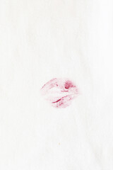 red lipstick kiss stain on white clothes