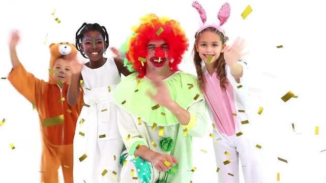 Confetti falling animation over children and clown celebrating in colorful costumes