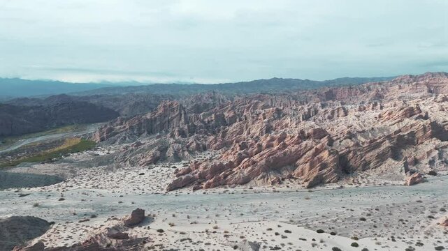 Panning aerial movement about the National Route 40 road on Quebrada de Las Flechas, Salta, Argentina, South America.