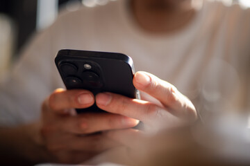 Close up man using smart phone, Social media marketing concept. hand using smartphone typing, chatting conversation in chat box icons pop up