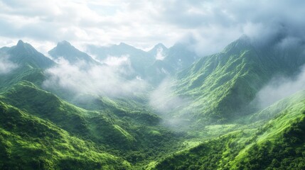 The mountains are covered in lush green trees and the sky is cloudy