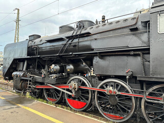 Old locomotive at the station platform