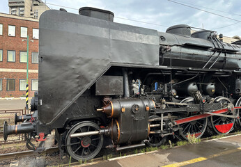 Old locomotive at the station platform