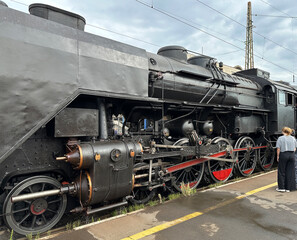 Old locomotive at the station platform