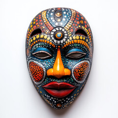 Colorful African mask isolated on a clean white background.