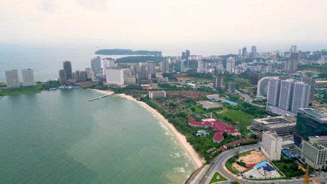 Drone shot of smart city real estate development, waterfront highrise buildings, Sokha Beach, Sihanoukville province