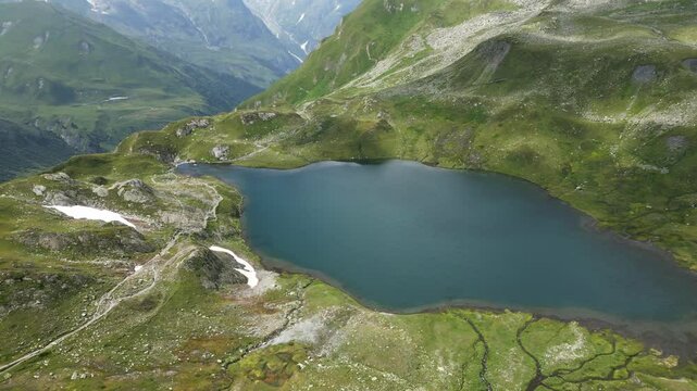 Drone shot of the beautiful lake of Fenetre in the Swiss Alps.