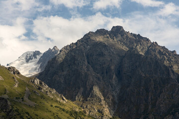 Scenic landscape, hills and snowcapped peaks of Ala Archa national park