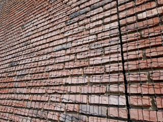 house has a protective net to prevent nesting of pigeons on the window ledges. fecal pollution is thus limited to a minimum, broken and historic buildings are damaged the most