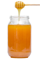 Prawdziwy miód pszczeli w słoiku spływający po kyzce do miodu