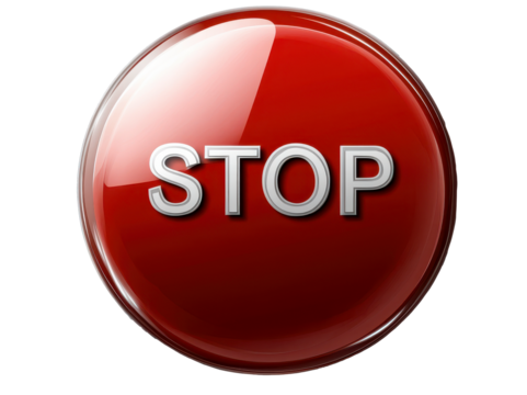 Big red button labeled STOP for safety controls in operation