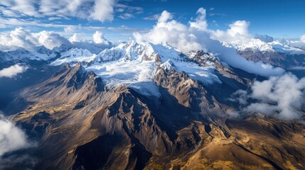 Fototapeta premium Aerial view of the majestic Huaytapallana Mountain, with snow-capped peaks and deep, icy crevasses