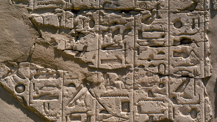 ancient hieroglyphs on a stone wall in egypt