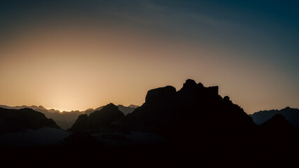 sunset with blue sky and clouds in the mountains in the desert of Egypt