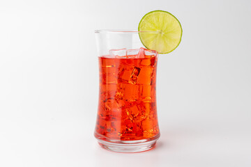 Icy Red Drink with Lemon on White Background