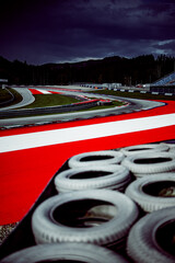 Race track. A high-speed corner of race ring during the day.