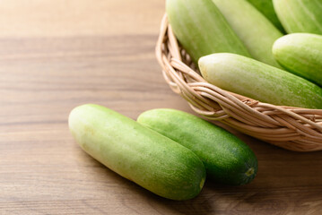 Fresh cucumber on wooden background, Organic vegetable, Food ingredient