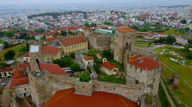 Stunning 4K drone footage capturing the majestic Heptapyrgion Fortress in Thessaloniki. Experience breathtaking views of this historic landmark from the sky