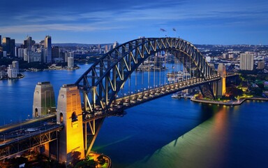 Naklejka premium Aerial View of Sydney Harbour Bridge: Dynamic Cityscape Background