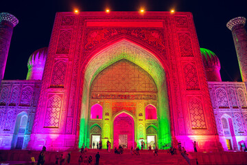 Light show on the facades of the madrasahs of Registan Square.