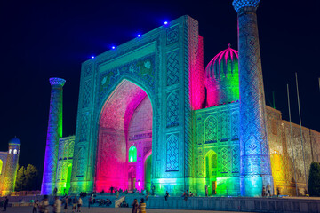 Light show on the facades of the madrasahs of Registan Square.