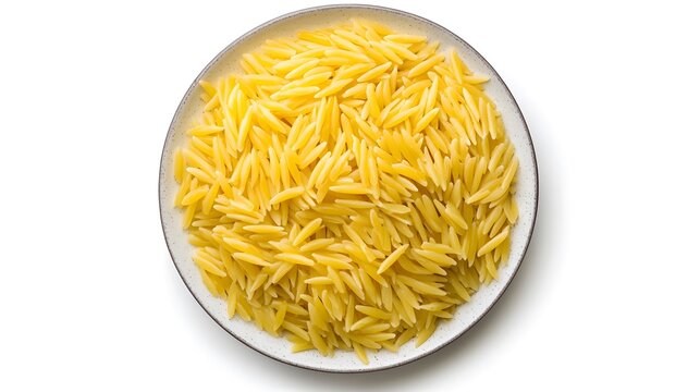 Top view of cooked orzo pasta in a white ceramic plate on plain background