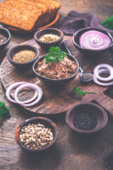 Homemade liver pate with  wholewheat bread, onions and herbs