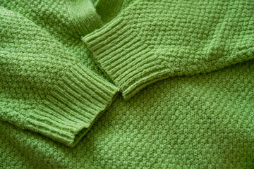 Sweater. Green sweater. Handmade. Crochet. Knitting needles. Knitted blanket Knitted scarf. Scarf. Knitted print. Autumn. Winter. Print. Pattern. Autumn atmosphere. Winter cold. Symmetrical pattern. L