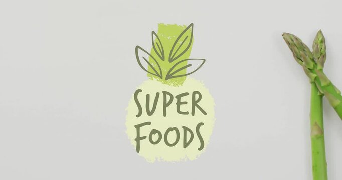 Super Foods text with green pineapple and asparagus animation