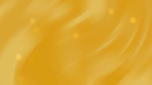 Gold gradient background with blurred yellow spots. Perfect for luxury, glamour, elegance, and high end designs or backgrounds. Ideal for upscale branding materials.