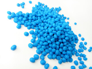 blue masterbatch granules, hot cutting polymer pigment blue type, isolated on white background, for plastic manufacturing industry company profile product catalog design