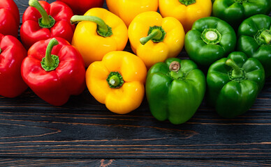 Fresh sweet bell pepper ( paprika ) photography red , green and yellow . Colorful vegetable . Top view