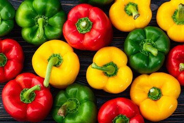 Fresh sweet bell pepper ( paprika ) photography red , green and yellow . Colorful vegetable . Top view
