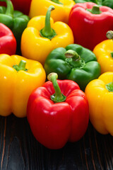 Fresh sweet bell pepper ( paprika ) photography red , green and yellow . Colorful vegetable . Top view