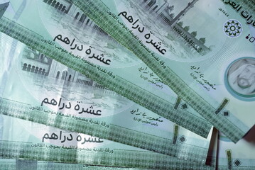 Close up Dirhams currency with new design Notes, AED, Bank notes and coins, United Arab Emirates