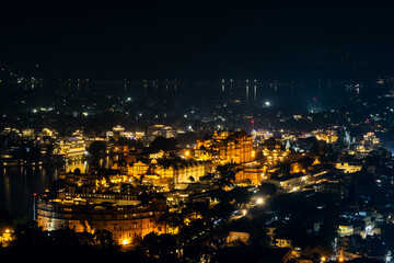 night view of lake city with with dramatic lighting from unique perspective