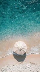 Naklejka premium Aerial View of Sun Umbrella on a Stunning Summer Beach with Large Blank Space for Text