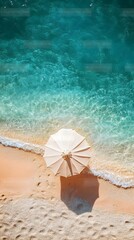 Naklejka premium Serene Beachside Solitude Aerial View of Solitary Sun Umbrella on Tranquil Sandy Shore