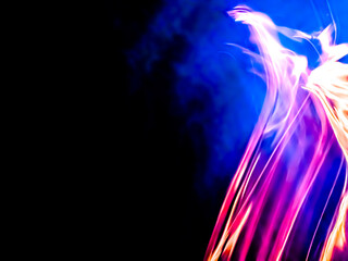 The abstract background shows a dynamic flowing vortex of fire with luxurious golden colors and lines evoking a sense of energy, power, warmth, and transformation, making this image perfect for themes